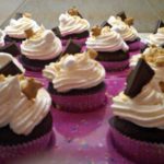 s'more cupcakes in a pink cupcake tray