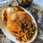 Baked Chicken & Wild Rice on a white serving platter