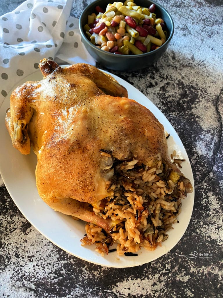 Baked Chicken & Wild Rice on a white serving platter