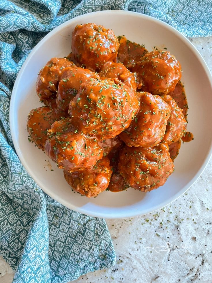 bowl of porcupine meatball with tomato sauce
