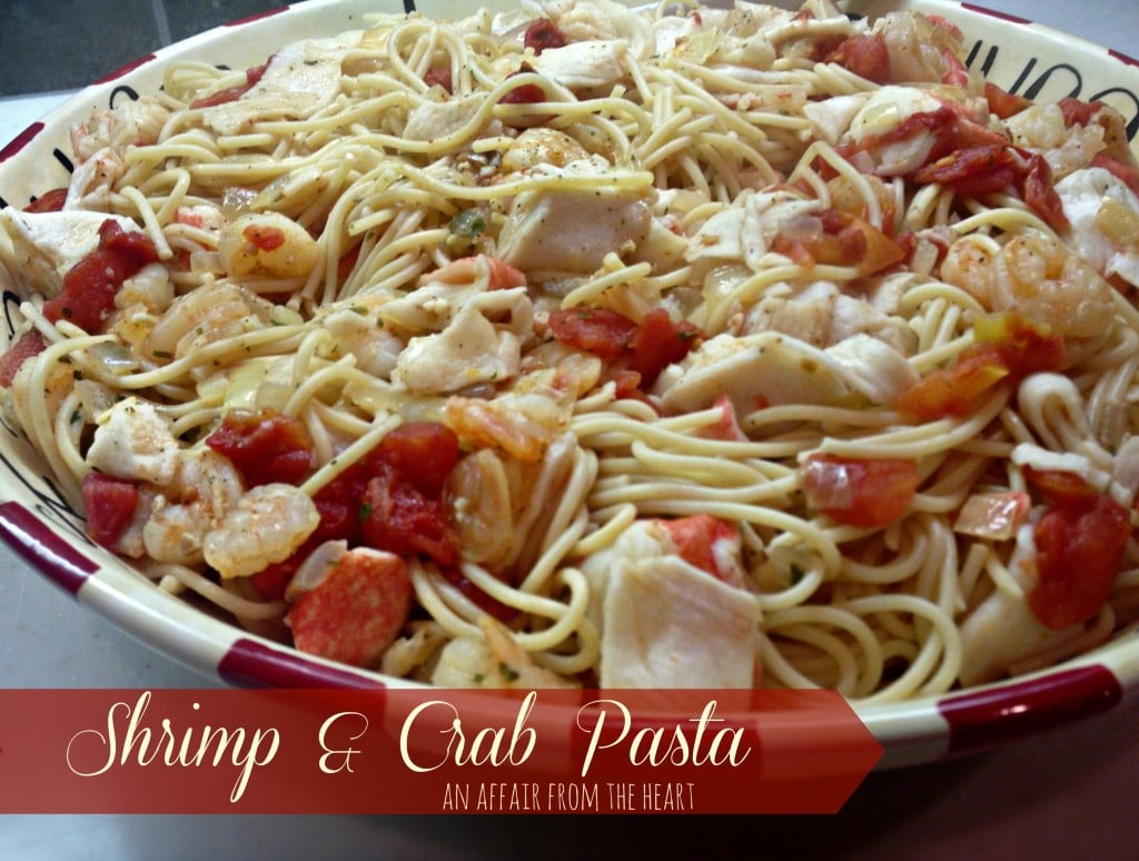 shrimp and crab pasta in a bowl