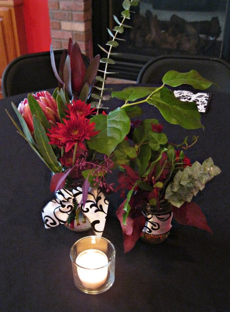 Flowers and a candle on a table