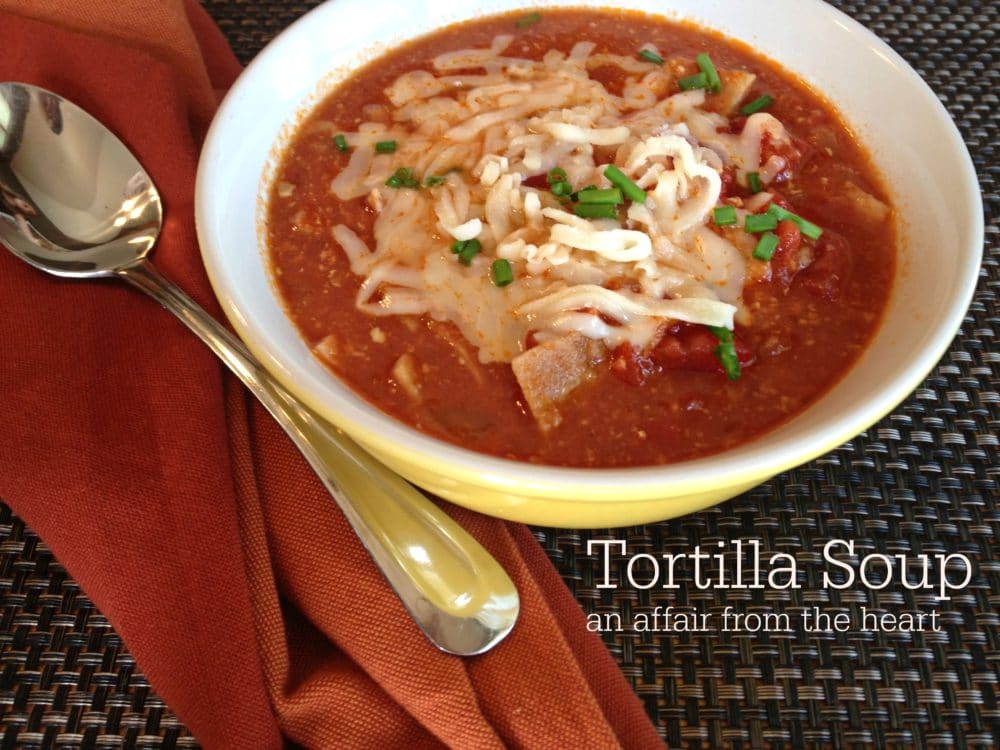 tortilla soup in a white bowl