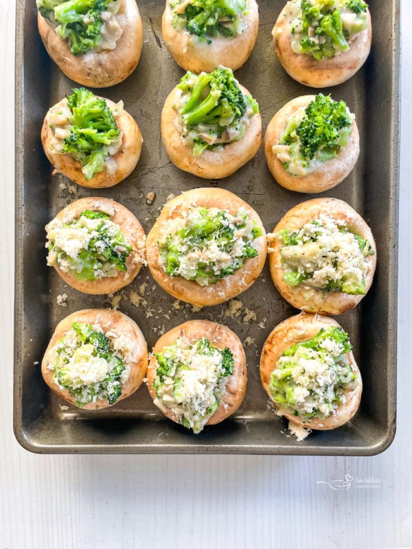 mushrooms on tray with broccoli and cheese
