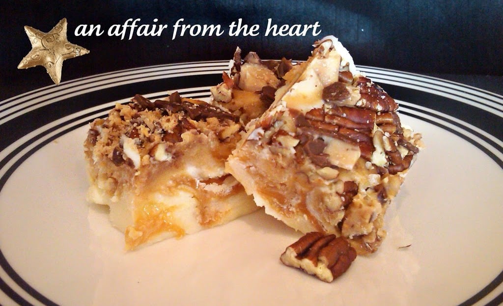 close up of caramel toffee pecan fudge on a white plate