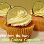 Side view of Pina Colada Cupcakes on a white plate