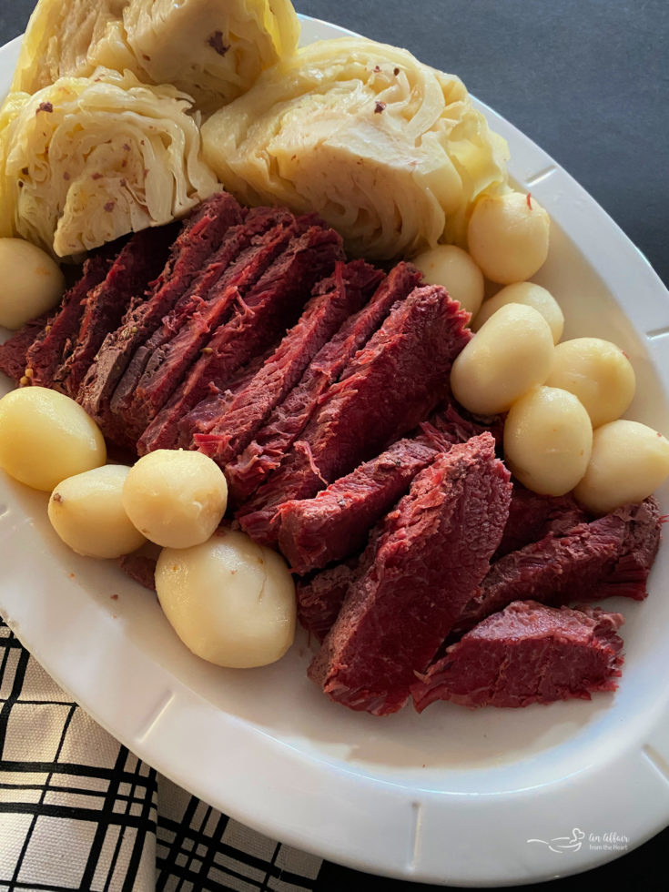 Corned Beef & Cabbage Dinner in a white serving dish