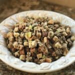 Mom's Sausage & Sage Dressing in a white serving bowl