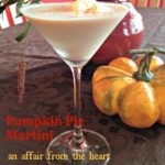 Side view of Pumpkin Pie Martini on a table with a mini pumpkin and text "pumpkin pie martini"