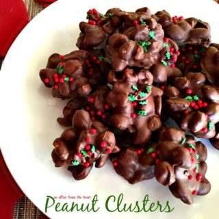 overhead of Peanut Clusters on a white plate with text "peanut clusters"