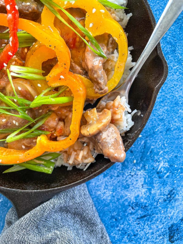 Close image of pepper steak in pan
