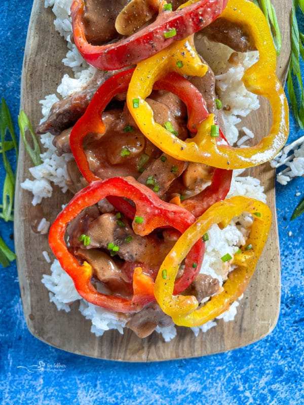 Top view of pepper steak with peppers
