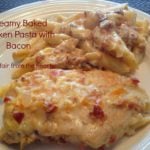 creamy baked chicken pasta with bacon on a white plate with text "creamy baked chicken pasta with bacon"
