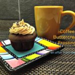 Side view of a cup cake plated and a cup of coffee with text "coffee buttercream frosting"