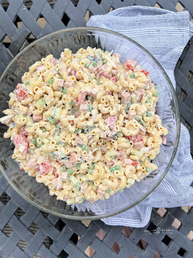 overhead of pasta salad with spam in a clear bowl