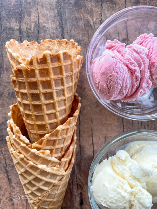 Cones with vanilla and strawberry ice cream