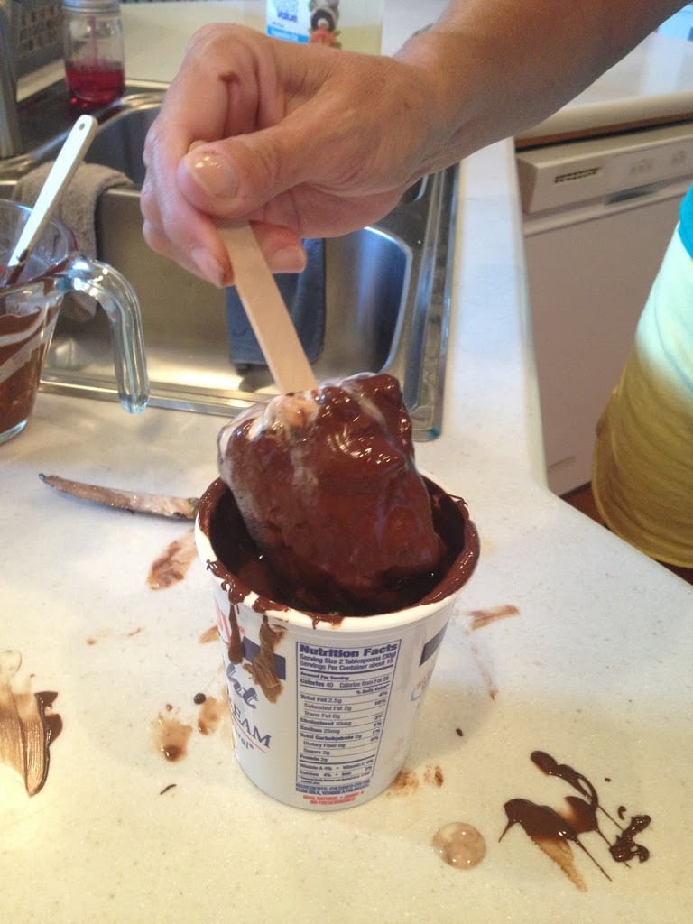 Buster bar being dipped in cup