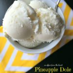 Disney's Pineapple Dole Whip in a white bowl with a spoon