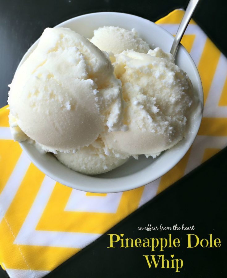 Disney's Pineapple Dole Whip in a white bowl with a spoon