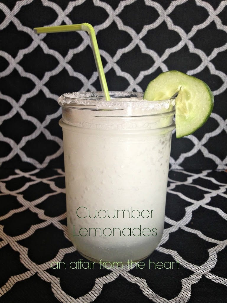 cucumber lemonadein a glass with a straw and text "cucumber lemonade"