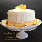 Side view of Peaches & cream spice cake on a white cake dish with text "peaches & cream spice cake"