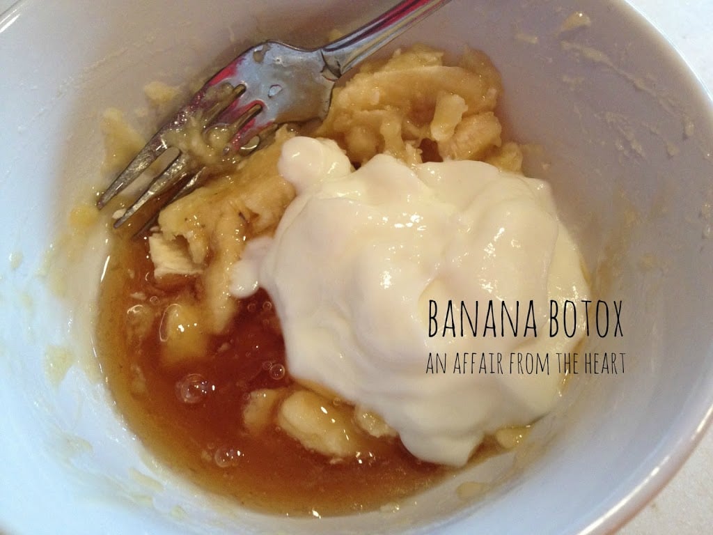 banana Botox ingredients in a white bowl being mixed together with a fork with text "Banana Botox"