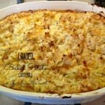 overhead of loaded baked potato casserole with text of the same
