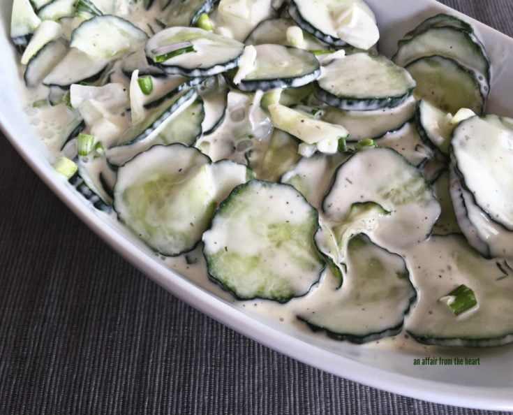 close up of Cucumber Ranch Salad in a white platter