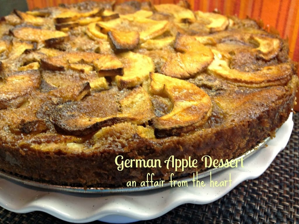 close up of German apple dessert on a white cake plate