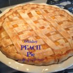 Close up of Whiskey peach pie with text of the same