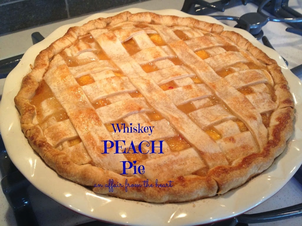 Close up of Whiskey peach pie with text of the same