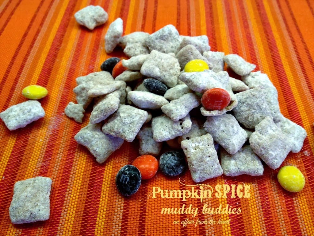 Pumpkin Spice Muddy Buddies on a striped table cloth