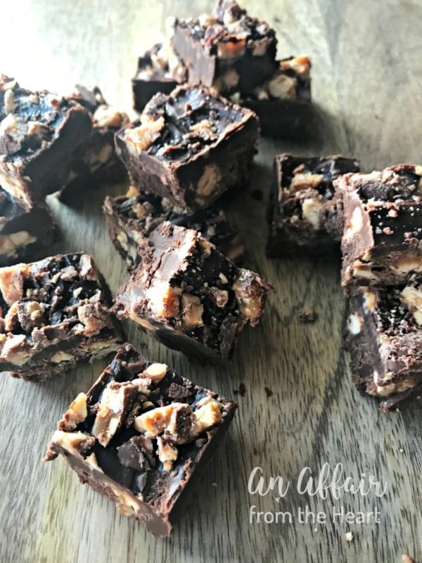 Candy Bar Fudge {Snickers Fudge} on a wood table