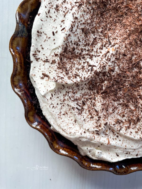 top view of French silk pie with whipped cream and chocolate