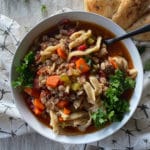 Hamburger Soup With or Without Noodles in a white bowl