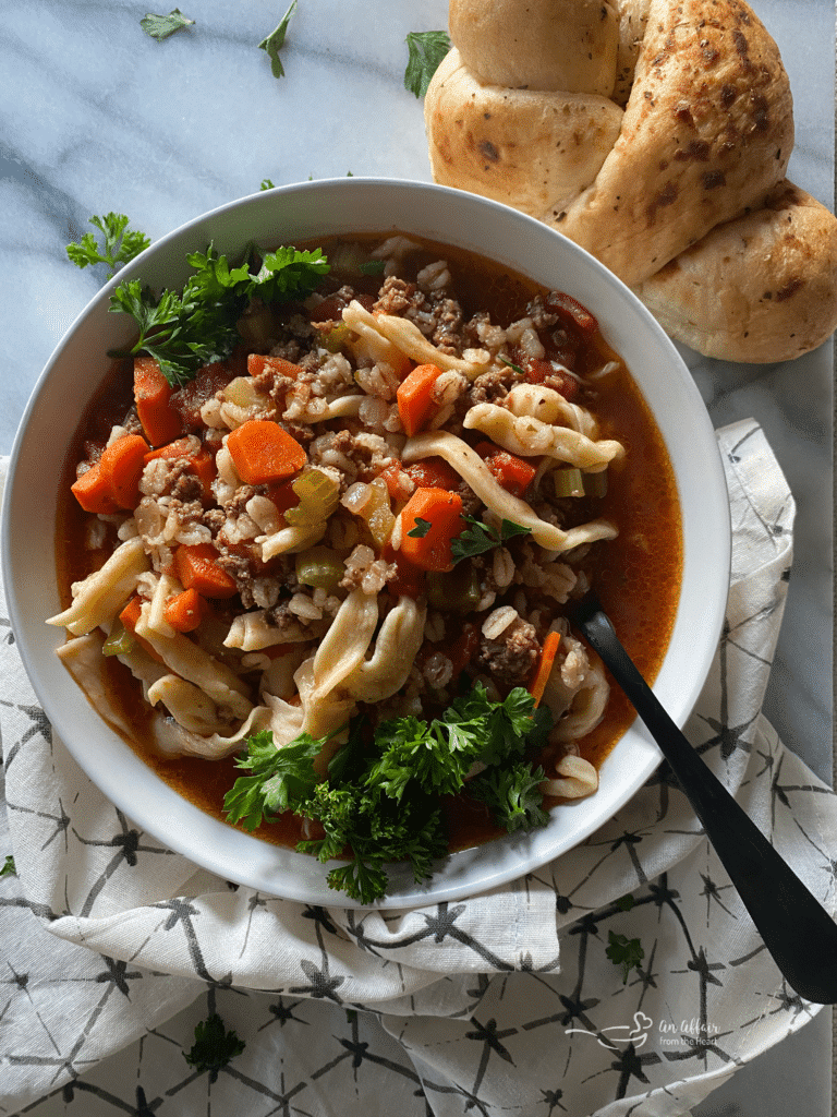 Hamburger Soup With or Without Noodles in a white bowl