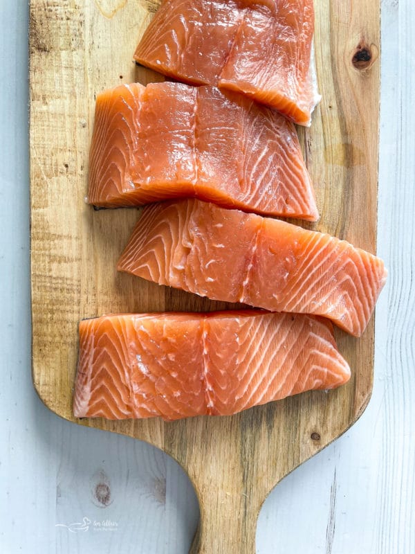 top view of salmon on cutting board