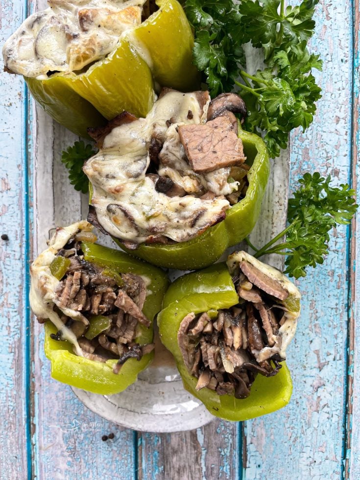 stuffed peppers with philly cheesesteak and garnishes