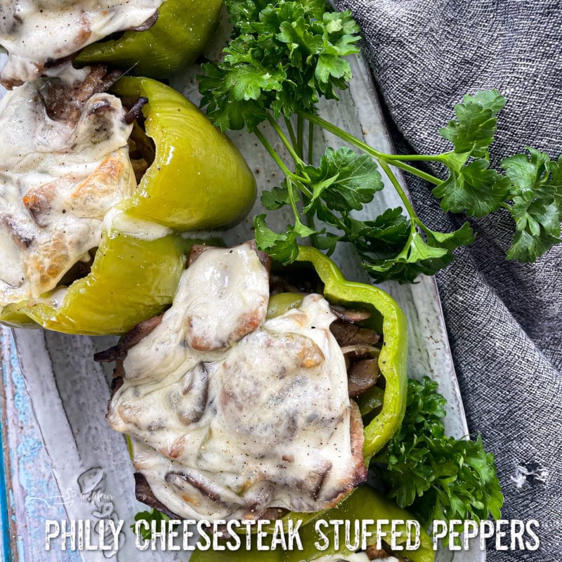 philly cheesesteak peppers stuffed image with text