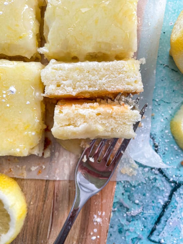 close view of lemon brownies with fork