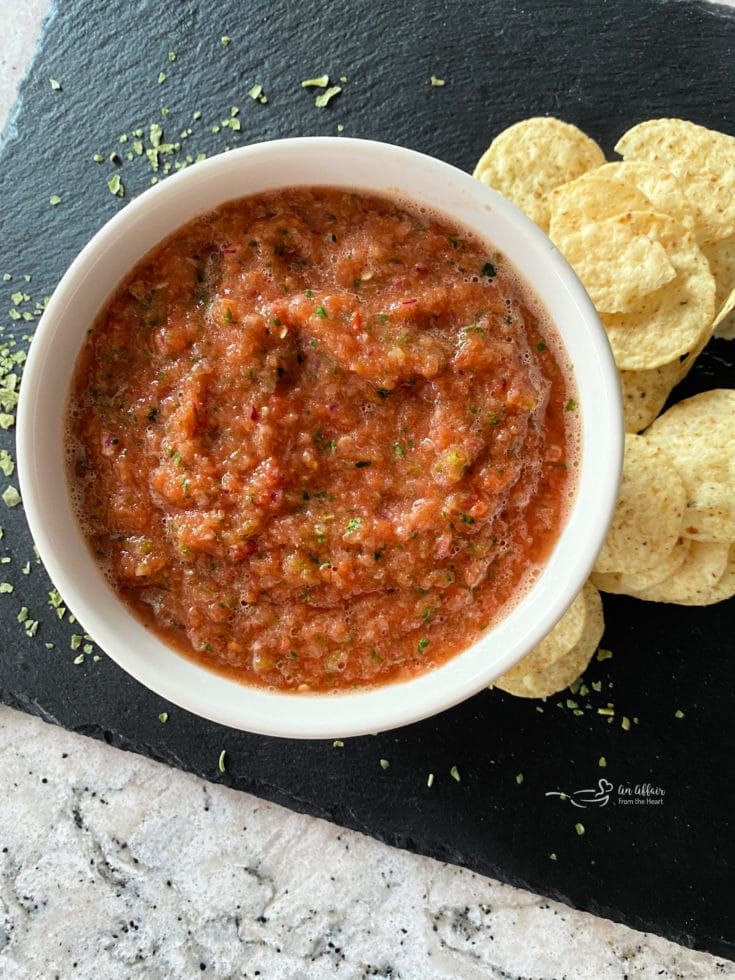 Overhead of Easy Dump Salsa with chips on a slate board