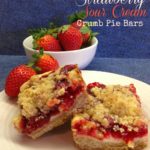 Strawberry cream cheese crumb pie bars and fresh strawberries on a white plate with a bowl of fresh strawberries in the background. Text "strawberry cream cheese crumb pie bars"