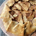 close up of Apple Crostata on a wood board