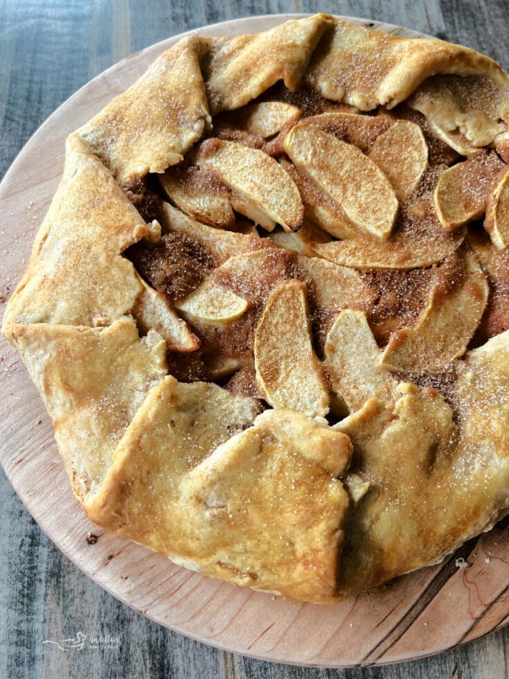 close up of Apple Crostata on a wood board