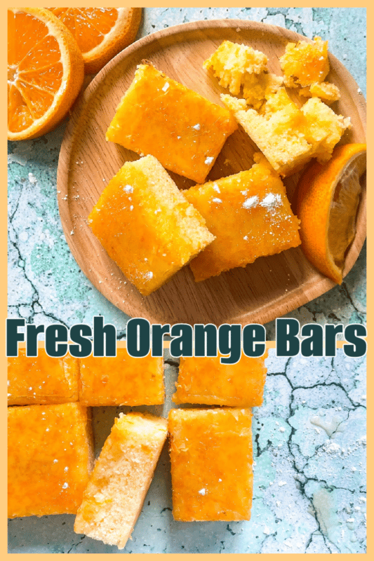Fresh Orange Bars blue background wooden plate