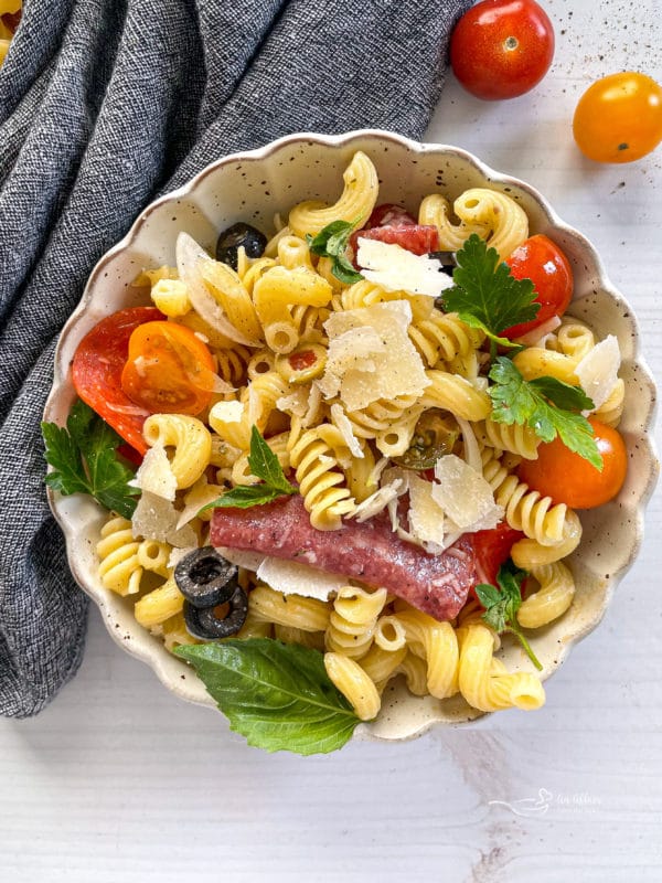 One bowl of pasta salad with tomatoes