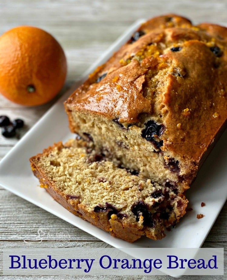 Blueberry Orange Bread with a honey orange glaze.Quickbread perfection!