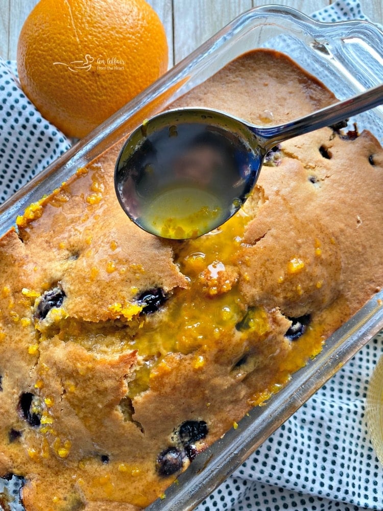 Blueberry Orange Bread with a honey orange glaze.Quickbread perfection!
