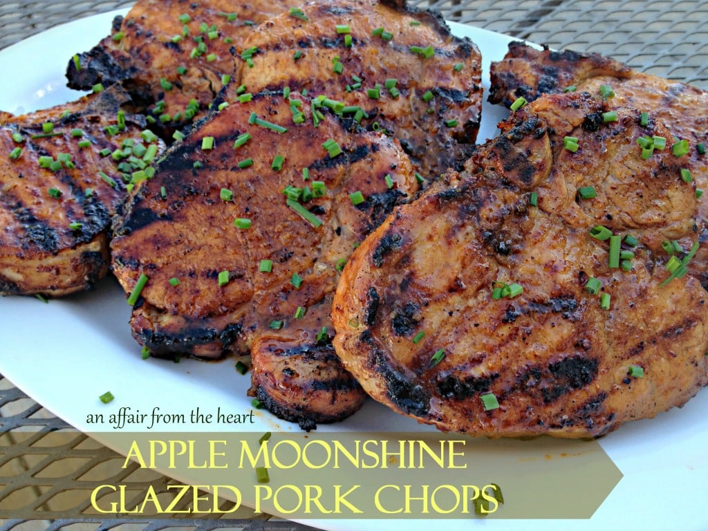 apple moonshine glazed pork chops white platter