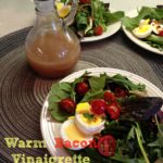 Vinaigrette in a bottle and a salad with text "warm bacon vinaigrette"